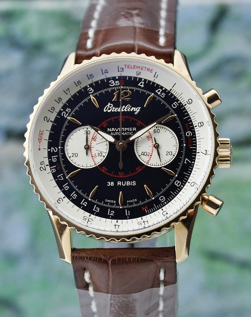 A BREITLING LIMITED EDITION 100 PIECES NAVITIMER 18K ROSE GOLD